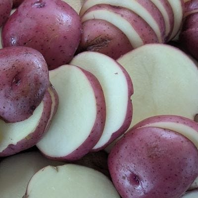 Pictures of meat and whole and sliced potatoes