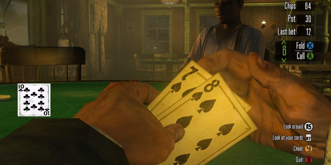 A screenshot from Red Dead Redemption. First person of hands peeking at poker cards. Controls for playing poker are on the HUD. "Cheat: Y" are among the controls.