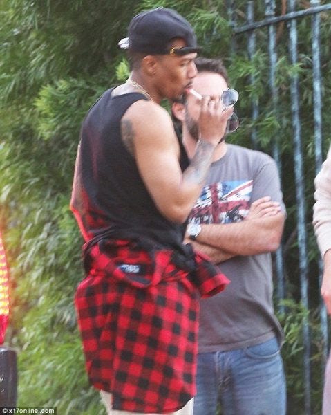 nick cannon sucking hard bare on lollipop back man 2015