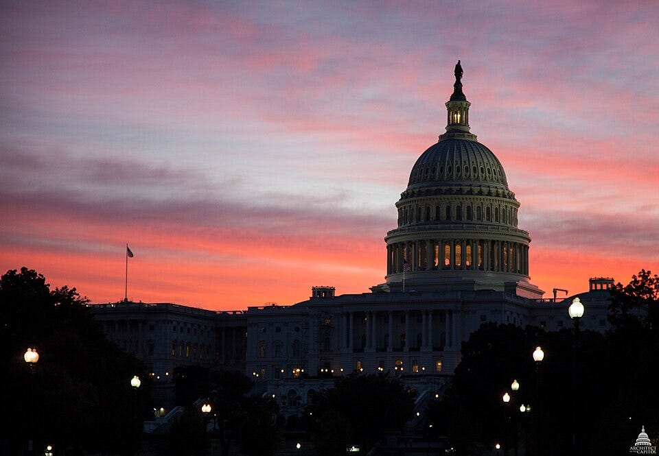 United States Capitol with a dome at sunset

AI-generated content may be incorrect.
