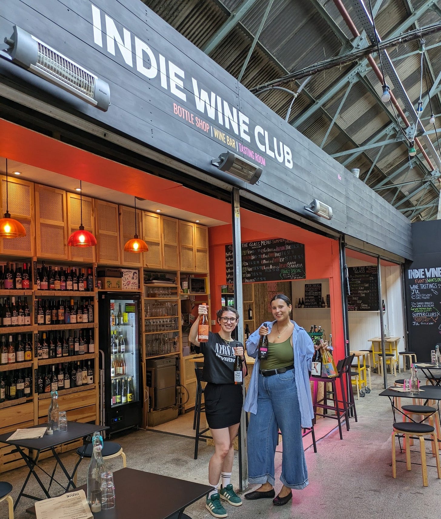 May be an image of 2 people, beer and text