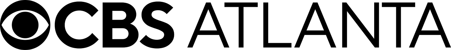 The CBS eye in black next to the letters CBS bolded in a sans serif, followed by the word ATLANTA thinner in the same sans serif. The CBS eye in black next to the letters CBS bolded in a sans serif, followed by the word ATLANTA thinner in the same sans serif.