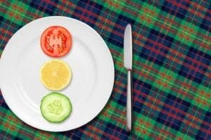 Plate with thin slices of vegetable