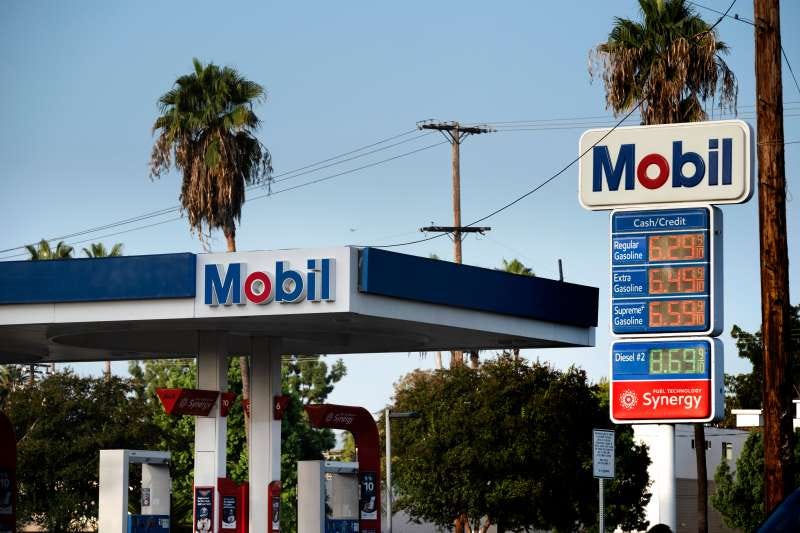 Mobil gas station sign showing high California gas prices with regular at $6.29 and diesel at $8.69 per gallon. Mobil gas station sign showing high California gas prices with regular at $6.29 and diesel at $8.69 per gallon.