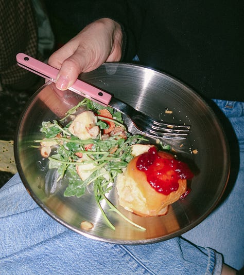 A gallery of three photographs: one of a bouquet of radishes in a jar, one of a woman eating a plate of seasonal food, and the third a closeup of the food on her place