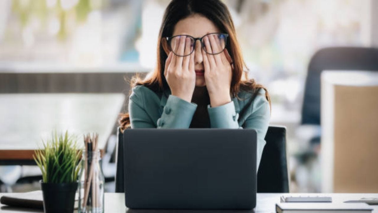stressed woman at computer