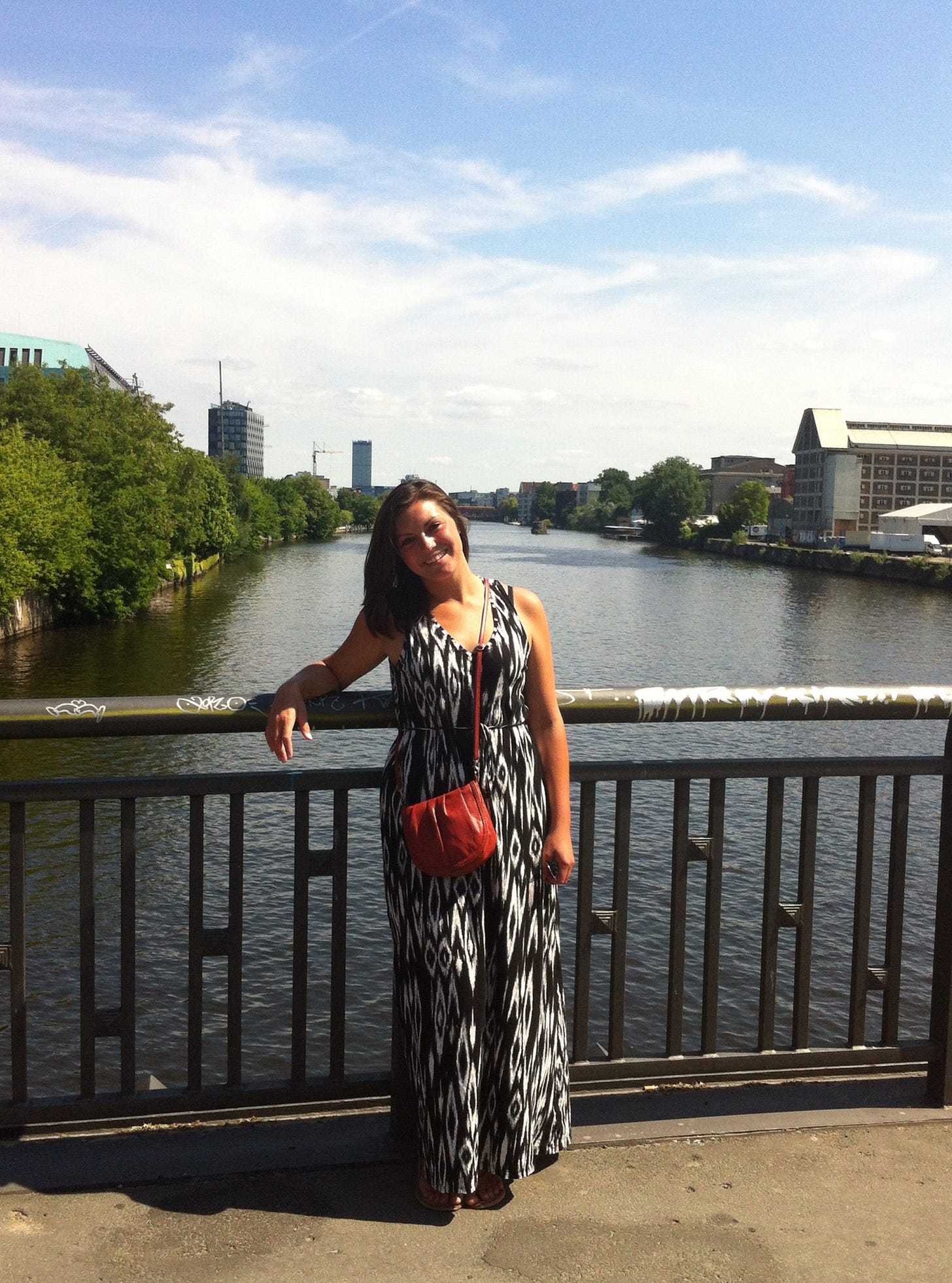 Kat smiling on a bridge in Berlin Kat smiling on a bridge in Berlin