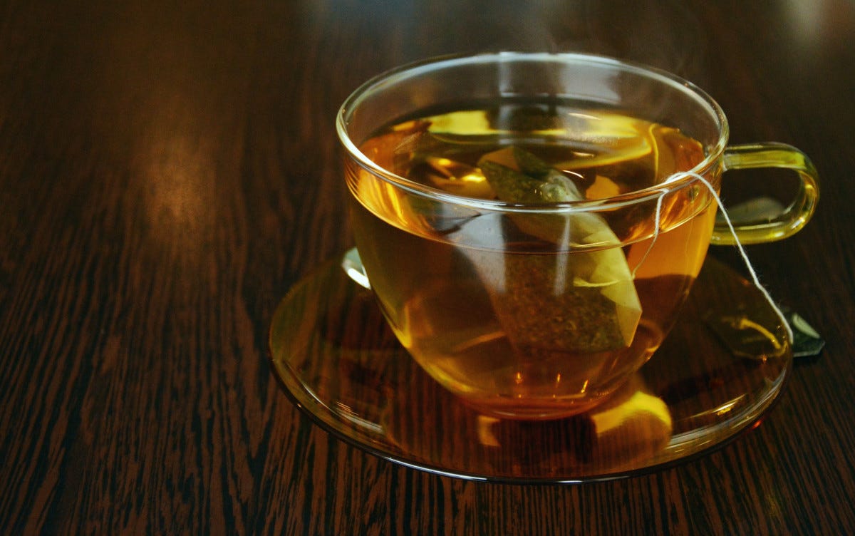 light, tea, glass, cup, golden, drink, teacup, hot drink, bright, whisky, tee, liqueur, enjoy, benefit from, tea bags, tea time, incidence of light, grog, distilled beverage
