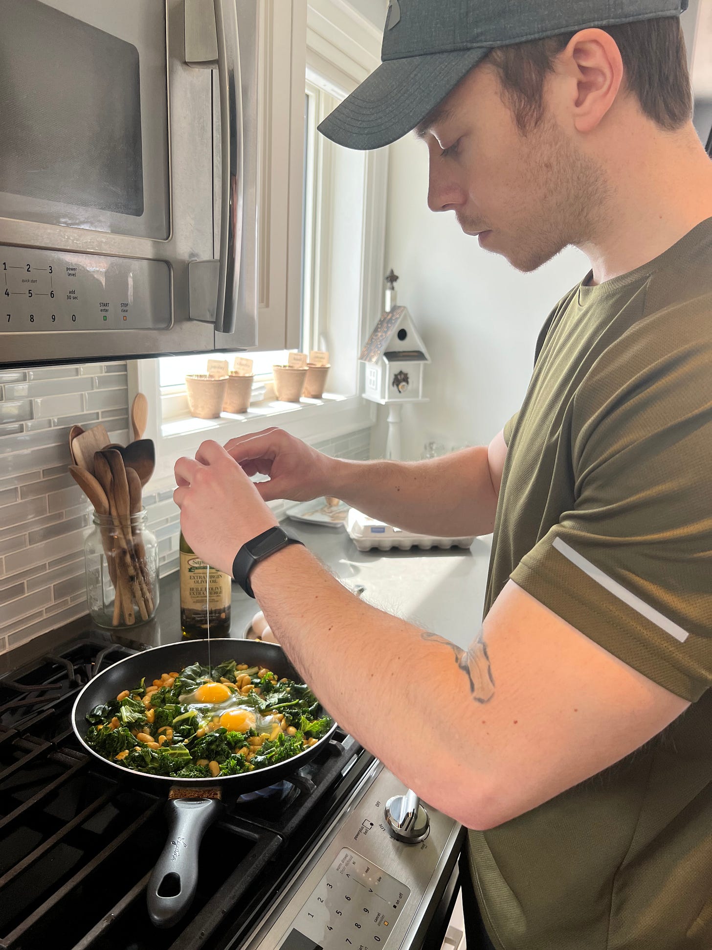 Cooking my slow carb diet lunch (white kidney beans, eggs, tuna, spinach, kale, swiss chard, olive oil, and a variety of spices). March 22, 2022. Cooking my slow carb diet lunch (white kidney beans, eggs, tuna, spinach, kale, swiss chard, olive oil, and a variety of spices). March 22, 2022.