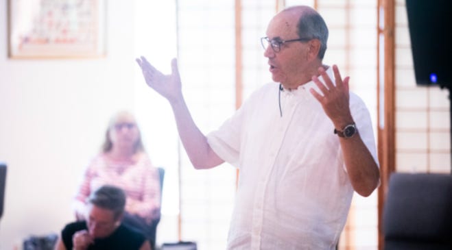 A man doing facilitation