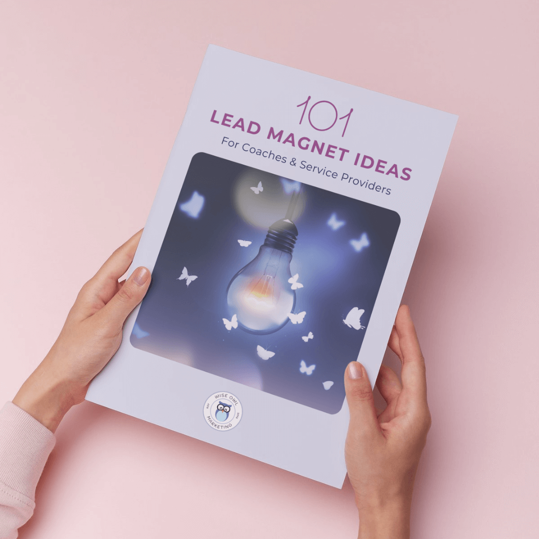woman holding lead magnet ideas guide in her hands against a pink background