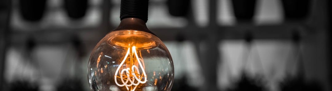 macro photography of clear light bulb