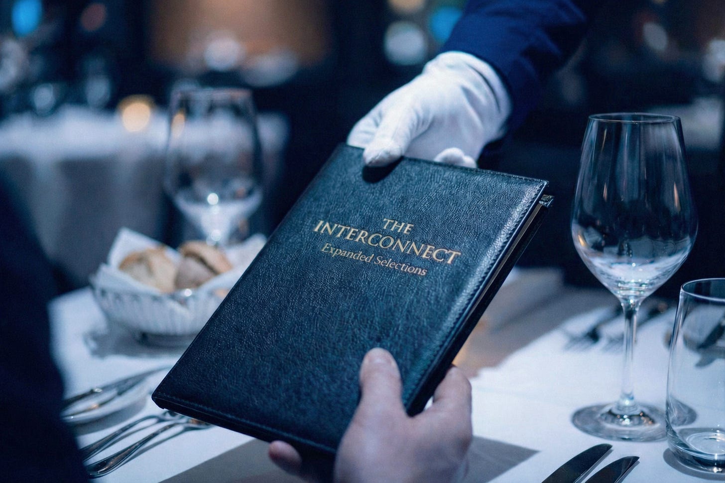 Restaurant menu for "The Interconnect" being handed by waiter