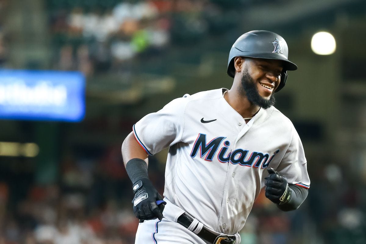Miami Marlins right fielder Bryan De La Cruz (14) rounds the bases after hitting a 3-run home run in the top of the seventh inning during the baseball game between the Miami Marlins and Houston Astros on June 12, 2022 at Minute Maid Park in Houston, Texas.