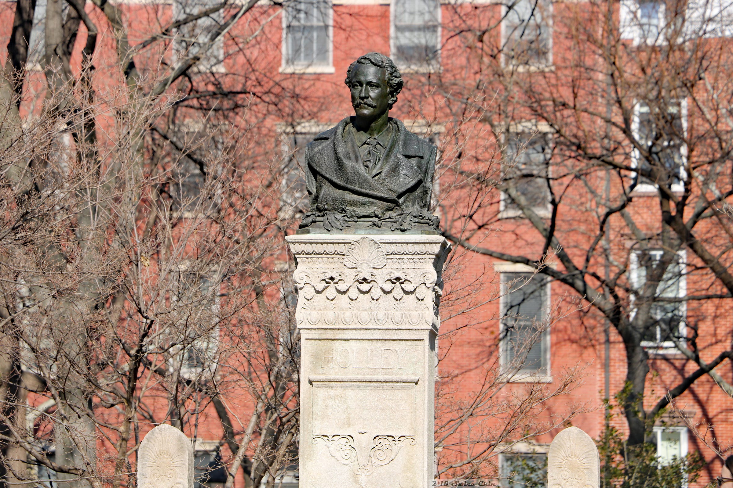 Bust of Alexander Lyman Holley in a quiet corner of Washington Square Park.