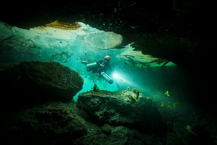 Klaus navigating the underwater caverns below Quintana Roo