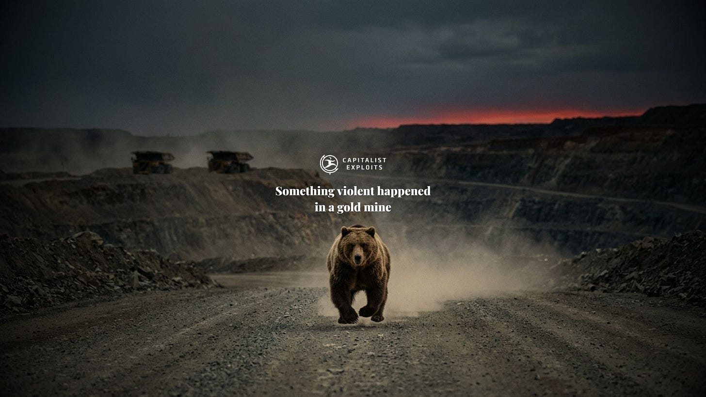 Grizzly bear running through open pit gold mine at dramatic dusk