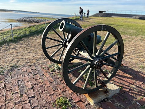 exhibits, sky, clouds, cannon, wheelbarrow