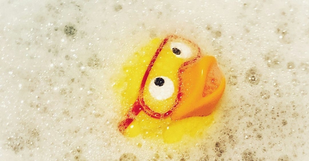 yellow and orange plastic toy