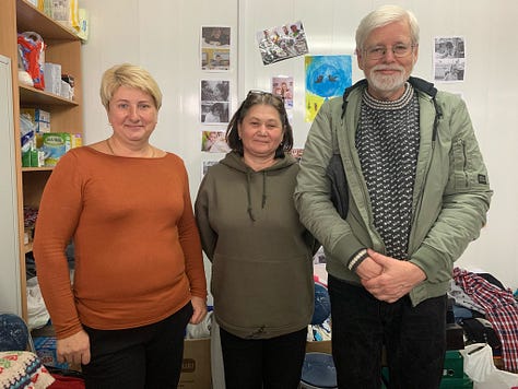 mages of hand-made pro-Ukraine wall posters featuring cats at a community help center in Dnipro, Ukraine.