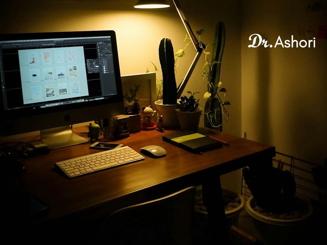 black flat screen computer monitor on brown wooden desk black flat screen computer monitor on brown wooden desk