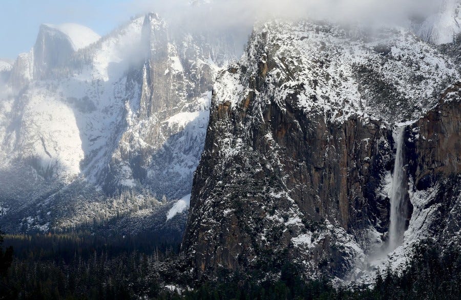 Snow-covered mountains above the Yosemite Valley Snow-covered mountains above the Yosemite Valley