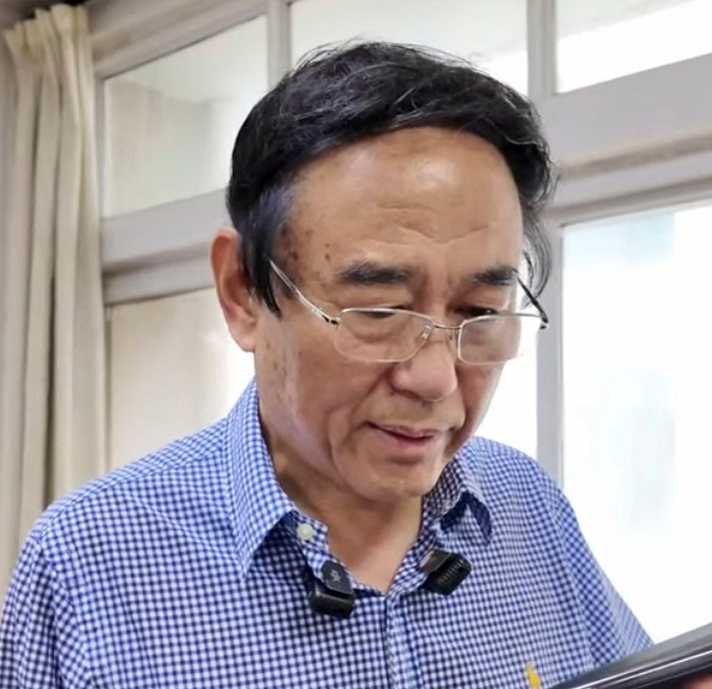 School vice-principal Bai Fan, above, just before he called Sakolsky to make the invitation. Photo: Sina School vice-principal Bai Fan, above, just before he called Sakolsky to make the invitation. Photo: Sina