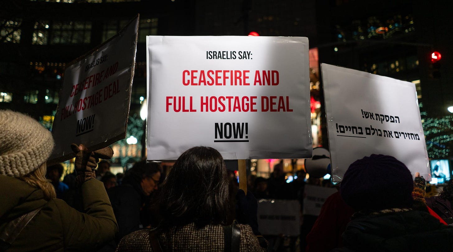 Left-wing Israelis protest in support of a Gaza ceasefire and the release of Hamas hostages, in midtown Manhattan, December 20, 2023. (Luke Tress) Left-wing Israelis protest in support of a Gaza ceasefire and the release of Hamas hostages, in midtown Manhattan, December 20, 2023. (Luke Tress)