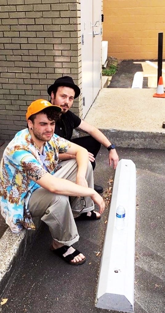 left image: Taylor York and Justin York of Paramore sitting on a curb outside the brick building of RCA Studio A; right image: the outside of RCA Studio B showing the bigger brick exterior painted brown