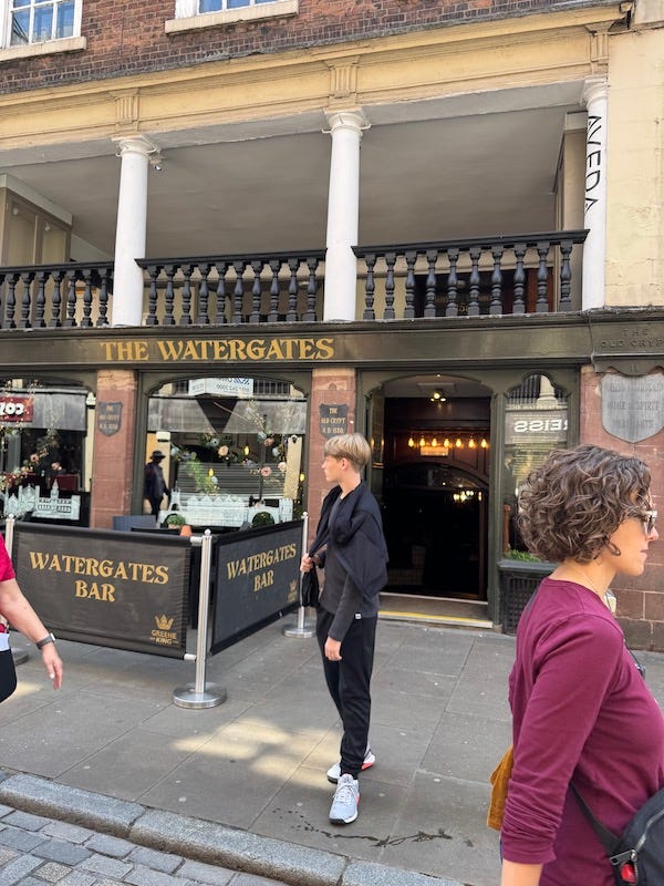 2025-6-17 Becky and Hudson in front of The Watergates Bar by Tanya Brinley