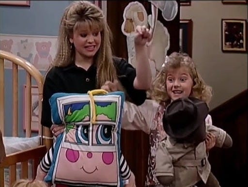 still from full house with DJ holding her pillow person and Stephanie holding Mr. Bear still from full house with DJ holding her pillow person and Stephanie holding Mr. Bear