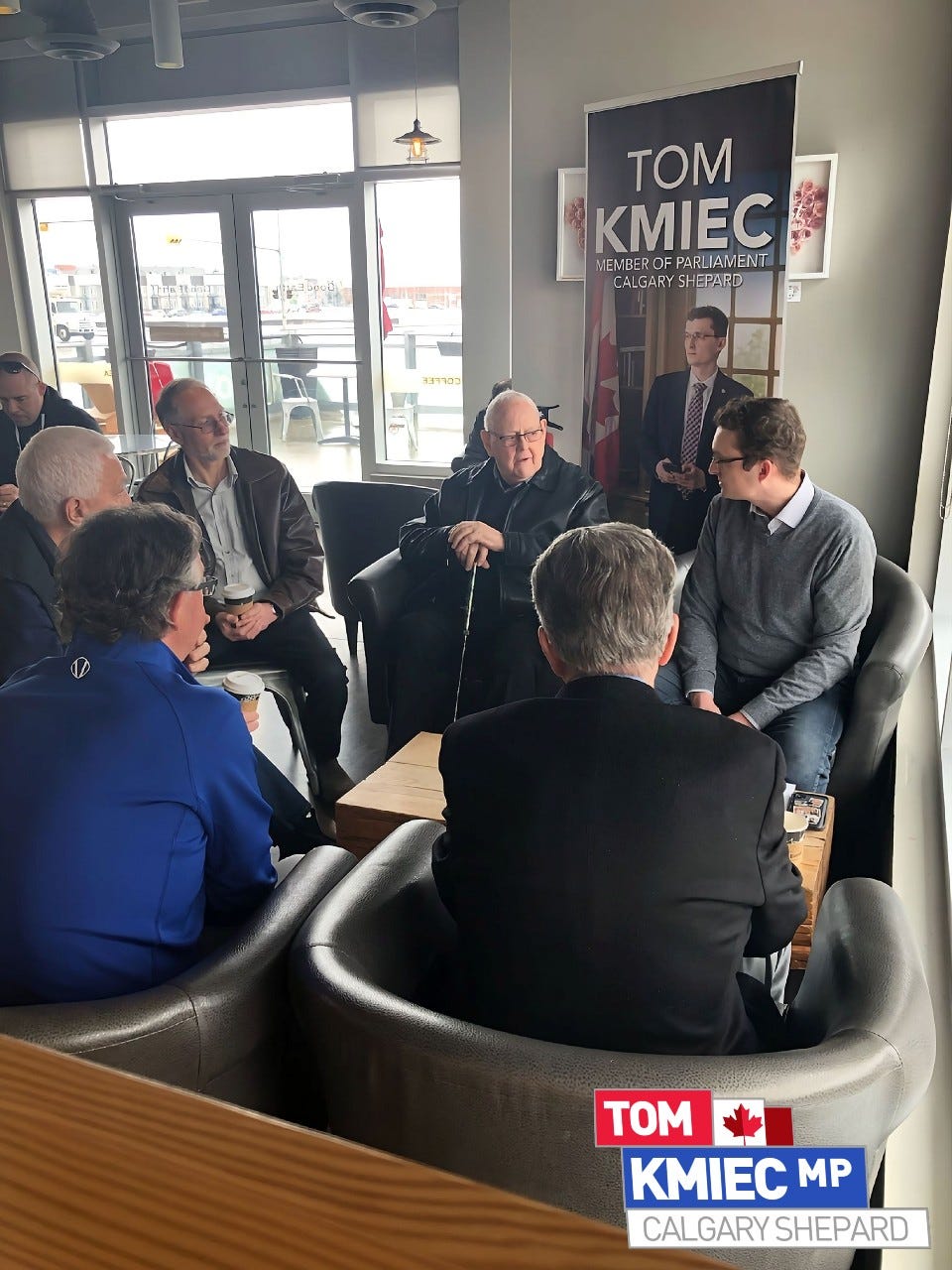 May be an image of 7 people, people sitting, indoor and text that says 'TOM KMIEC ME MEMBER PARLIAMENT CALGARY HEPARD 337703 TOM KMIEC MP CALGARY SHEPARD' May be an image of 7 people, people sitting, indoor and text that says 'TOM KMIEC ME MEMBER PARLIAMENT CALGARY HEPARD 337703 TOM KMIEC MP CALGARY SHEPARD'