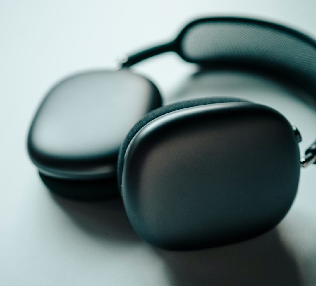 black sunglasses on white surface