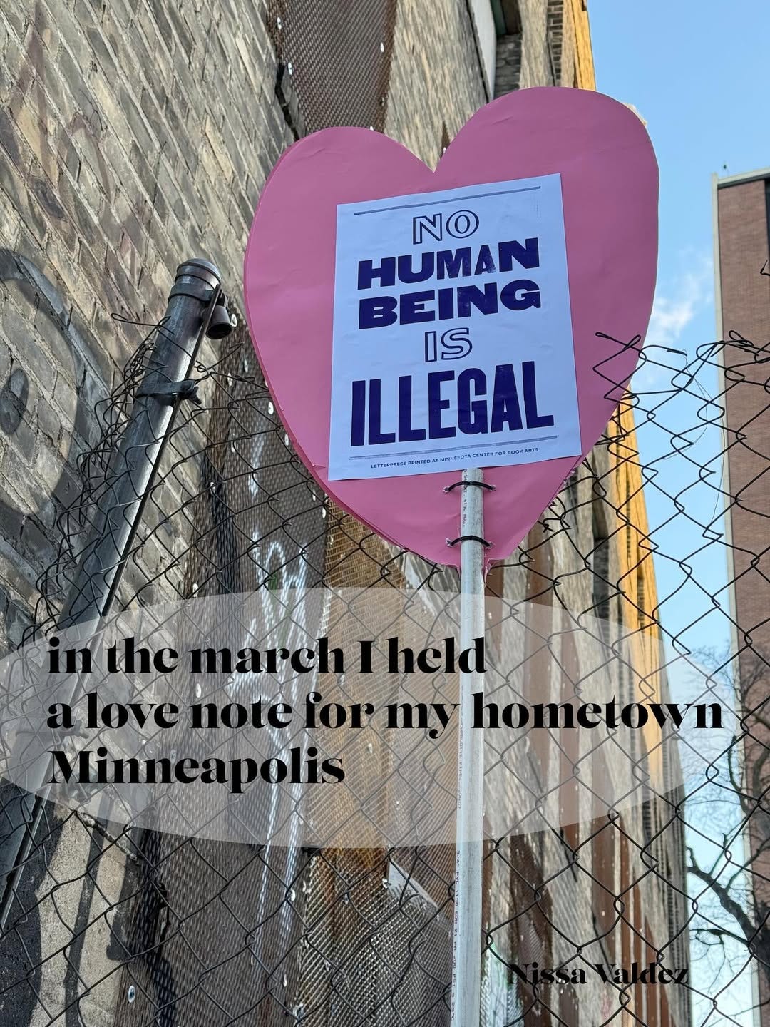 May be an image of text that says 'NO HUMAN BEING IS ILLEGAL inthe nthemarch march narchIheld Iheld lovenotciormy eformy homet homelown Minneapolis apolis'