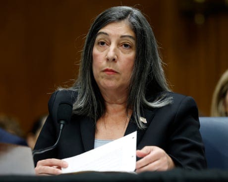 a women in front of a microphone 