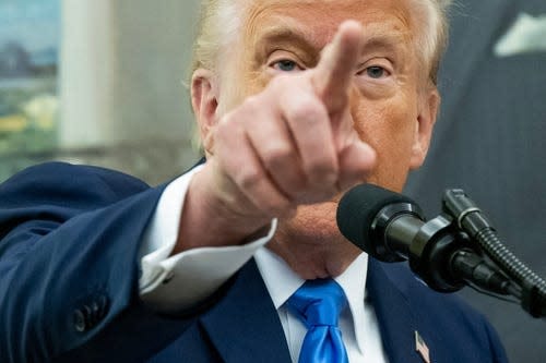 President Donald Trump speaks during a swearing in ceremony for Alina Habba as US Attorney General for New Jersey, in the Oval Office of the White House in Washington, DC, on March 28, 2025.