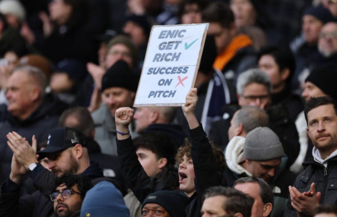LONDON, ENGLAND - FEBRUARY 16: A Tottenham Hotspur fan holds up a sign in protest against Daniel Levy, Chairman of Tottenham Hotspur and the ENIC Group during of the Premier League match between Tottenham Hotspur FC and Manchester United FC at Tottenham Hotspur Stadium on February 16, 2025 in London, England. (Photo by Catherine Ivill - AMA/Getty Images)
