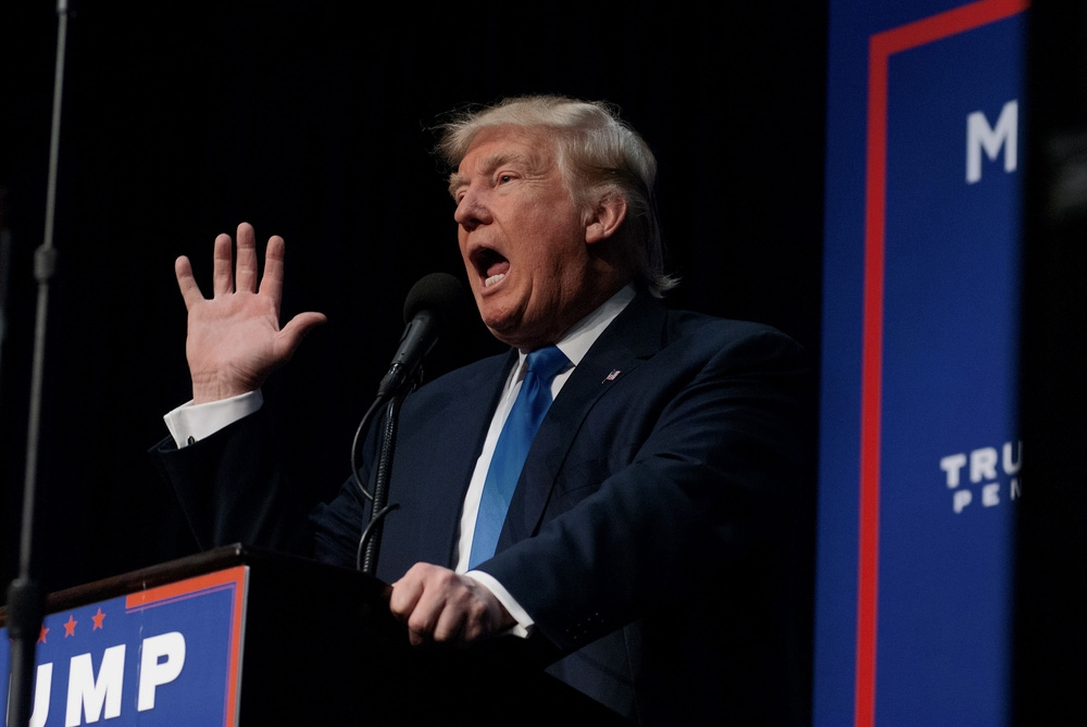 Donald Trump with raised hand