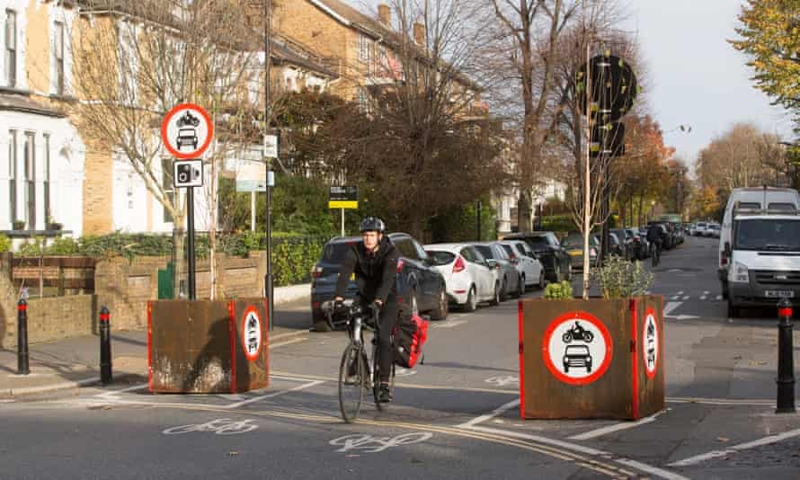 A cyclist at the edge of a low-traffic neighbourhood in Hackney, London