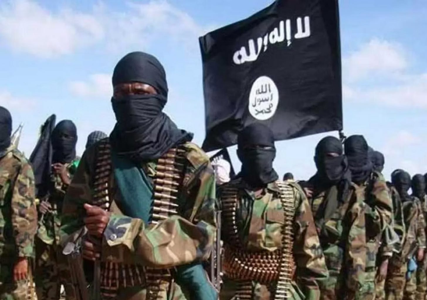 Al-Shabaab militants fly the ISIS flag in Somalia   Credit: ModernDiplomacy