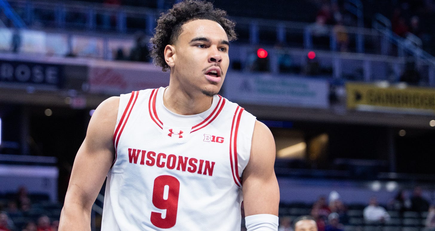 Wisconsin Badgers guard John Tonje (9) celebrates after a made basket Wisconsin Badgers guard John Tonje (9) celebrates after a made basket
