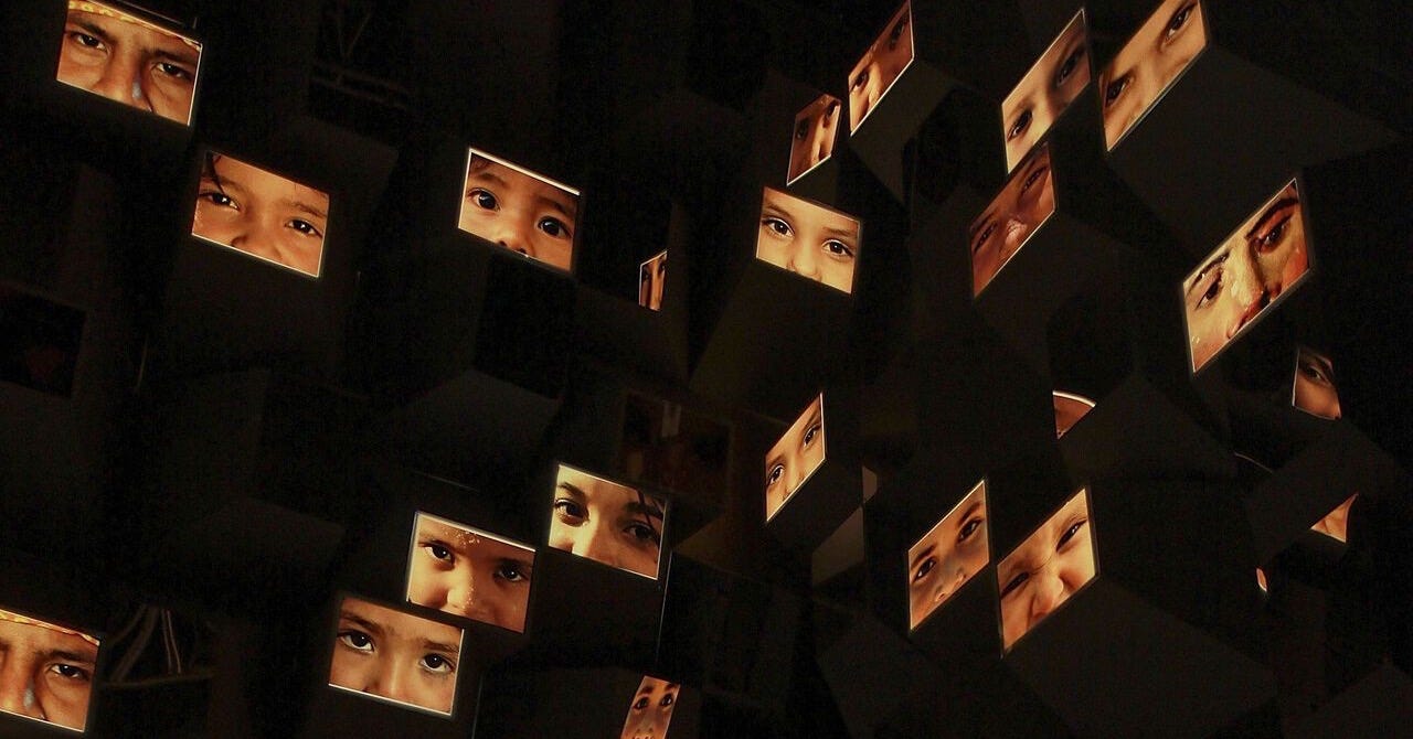 General view of 'En Tus Sentidos' by the artist artist Willy Sousa. lots of images of faces are shown. General view of 'En Tus Sentidos' by the artist artist Willy Sousa. lots of images of faces are shown.