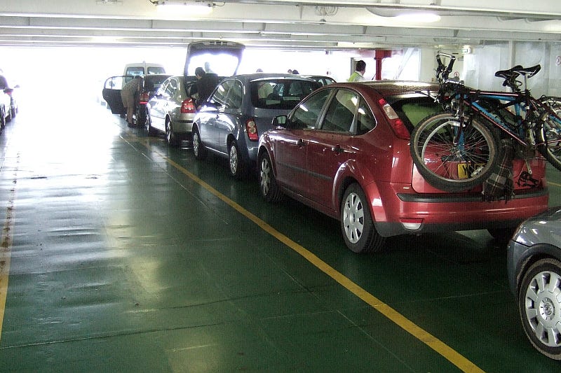 Cars on the deck of a car ferry Cars on the deck of a car ferry