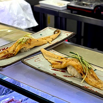 Pictures of the big fish market in Tokyo along with pieces of cut sushi.