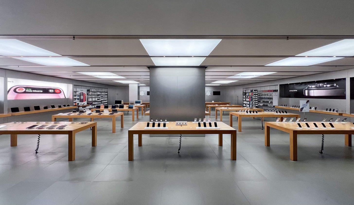 The interior of Apple Royal Hawaiian. The store has no customers inside.