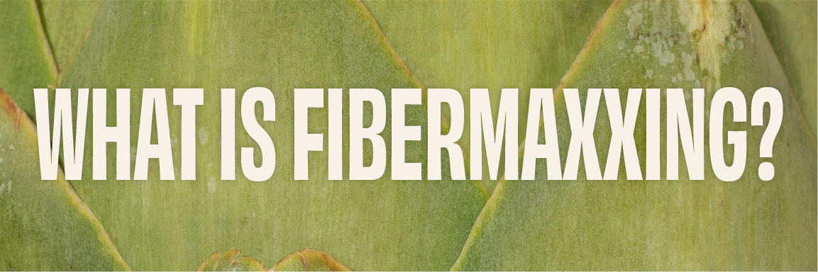 "WHAT IS FIBERMAXXING?" on a close-up photo of an artichoke