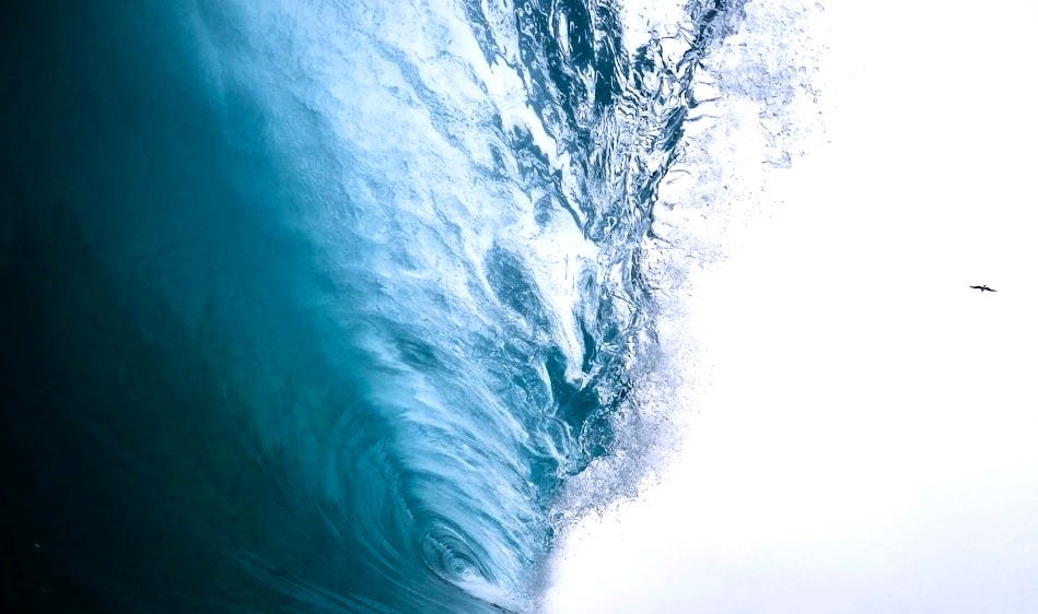 water waves under blue sky