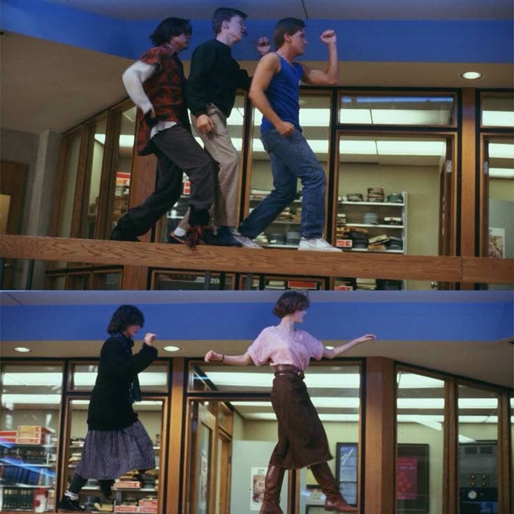 two people are walking up and down the stairs