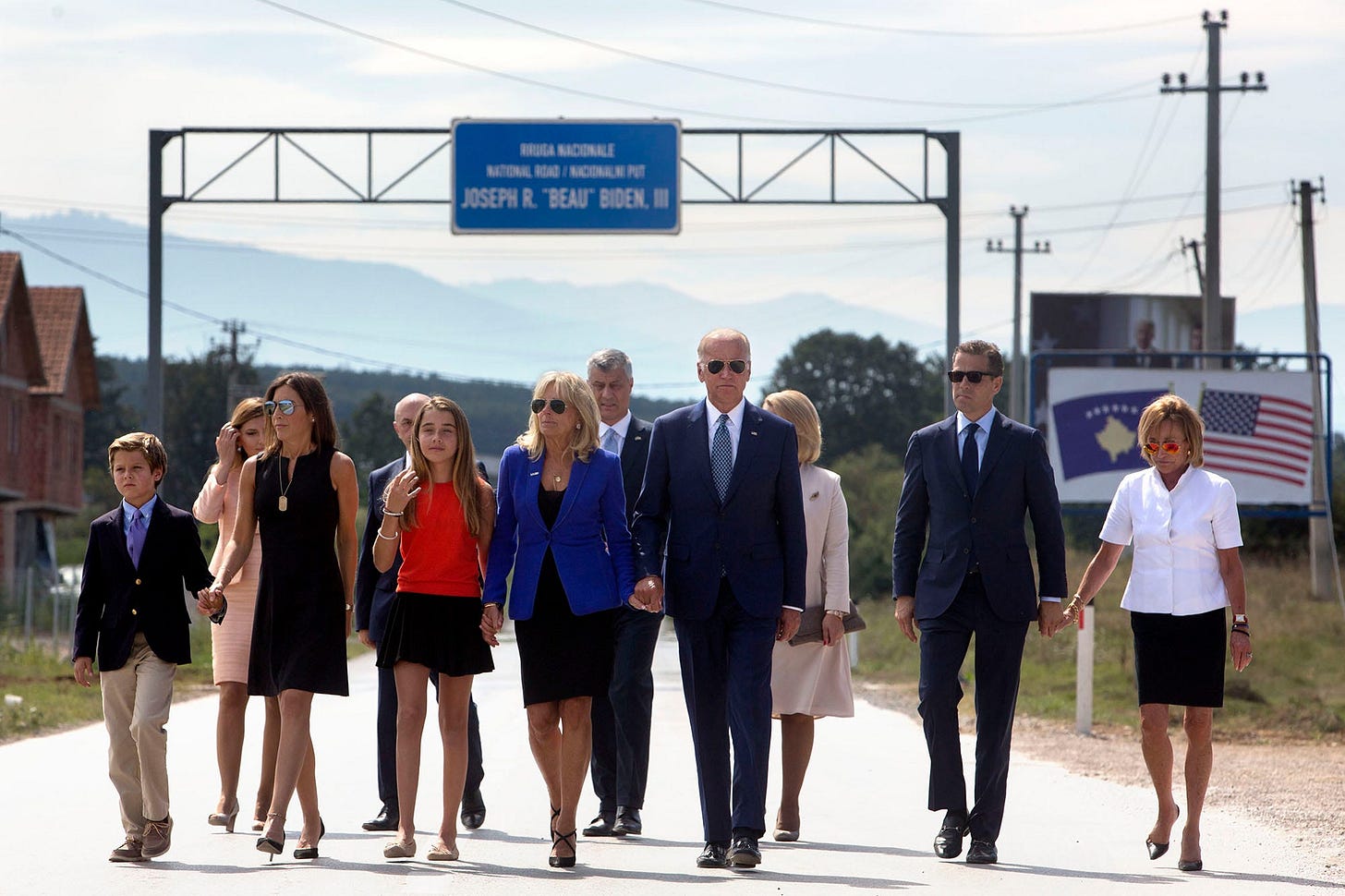 August 17, 2016: The Biden family, including Vice President Joe Biden and Dr. Jill Biden, cross a highway for a dedication ceremony in Kosovo, honoring Joseph R. 'Beau' Biden III with a road named in his memory. August 17, 2016: The Biden family, including Vice President Joe Biden and Dr. Jill Biden, cross a highway for a dedication ceremony in Kosovo, honoring Joseph R. 'Beau' Biden III with a road named in his memory.