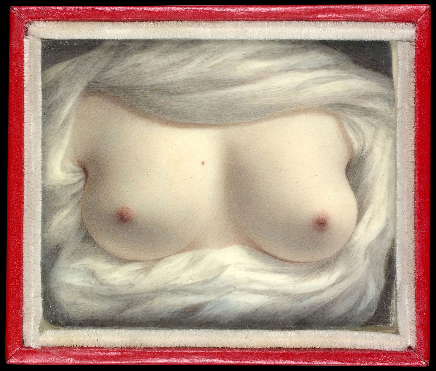 A miniature of a woman's breasts, surrounded by a swirl of white cloth